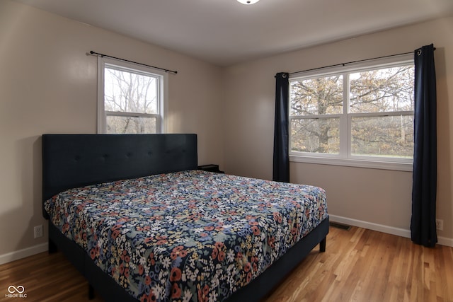 bedroom featuring light hardwood / wood-style floors