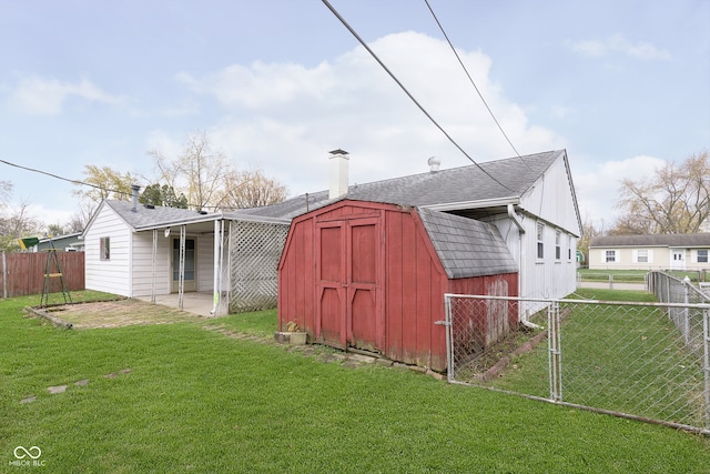 view of outdoor structure with a yard