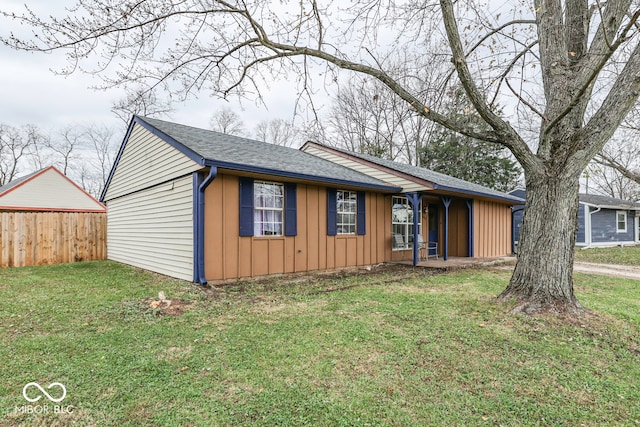 ranch-style house with a front yard