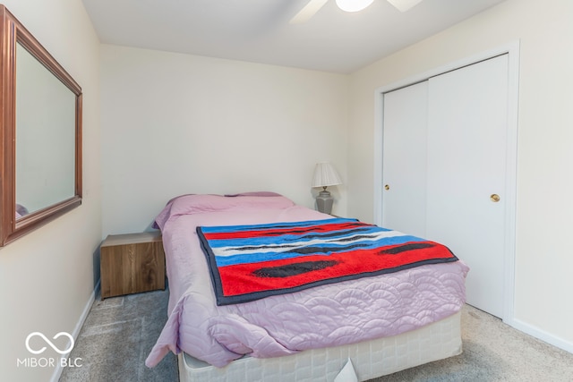 bedroom with carpet flooring, ceiling fan, and a closet