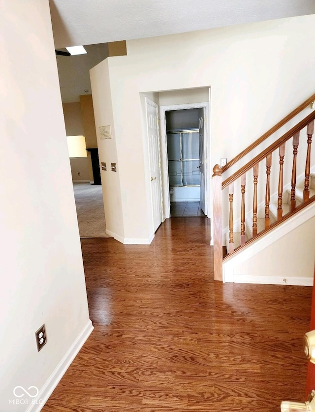 hall featuring dark hardwood / wood-style floors