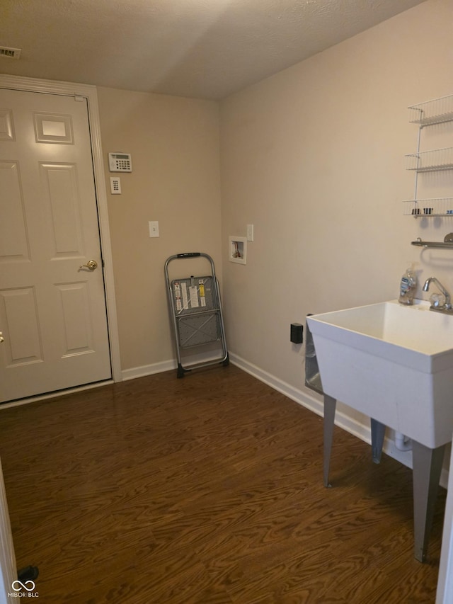 4835 Franklin Villas Dr, Indianapolis, IN 46237 - washroom featuring washer hookup and dark wood-style floors
