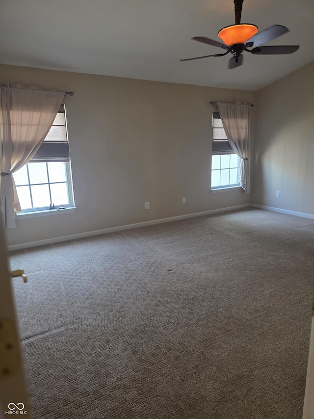 4835 Franklin Villas Dr, Indianapolis, IN 46237 - carpeted empty room featuring plenty of natural light and ceiling fan