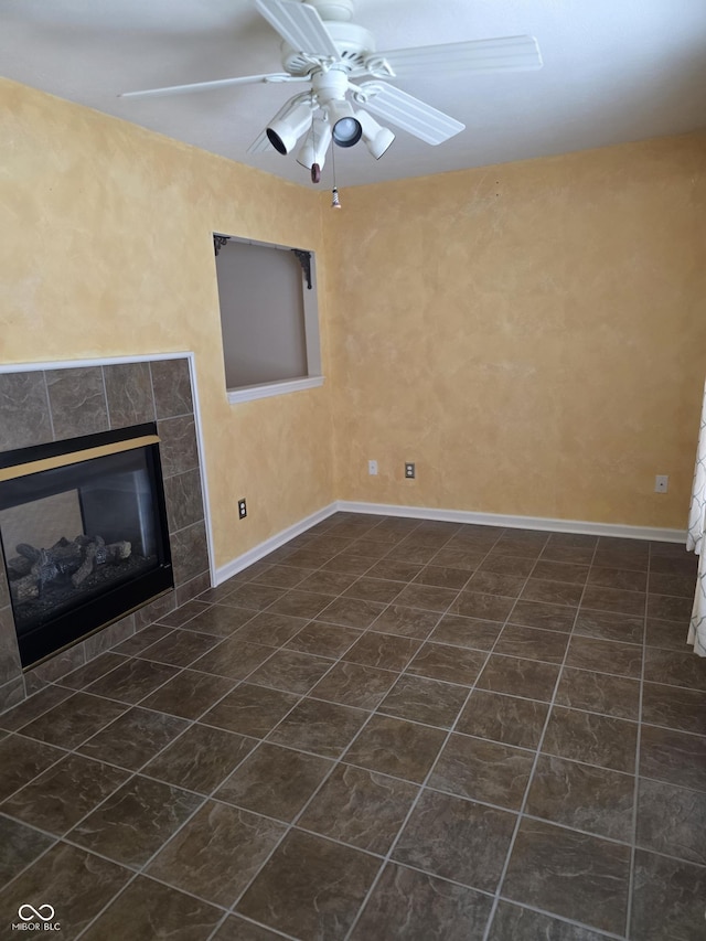 4835 Franklin Villas Dr, Indianapolis, IN 46237 - unfurnished living room with ceiling fan and a tile fireplace