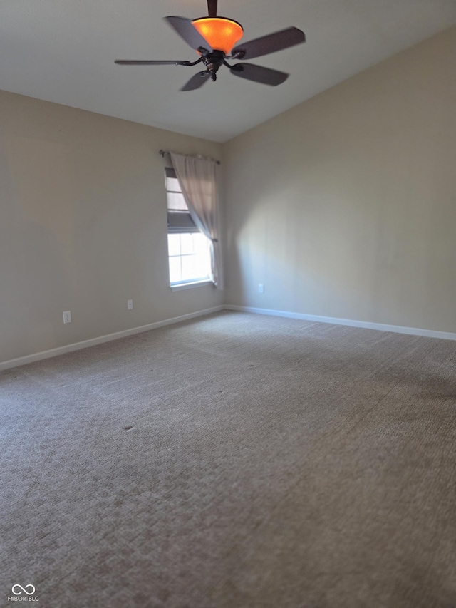 4835 Franklin Villas Dr, Indianapolis, IN 46237 - carpeted spare room with baseboards and ceiling fan