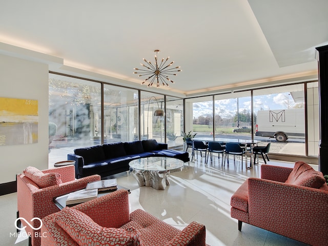 living room with a notable chandelier