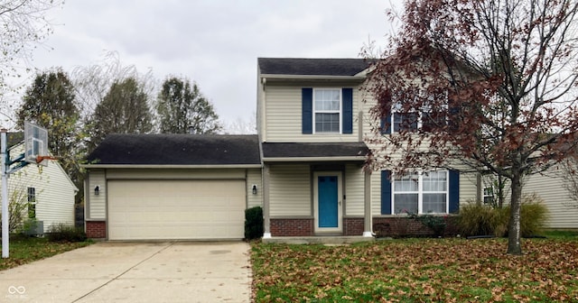 front of property with a garage