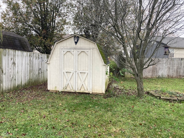 view of outdoor structure with a lawn