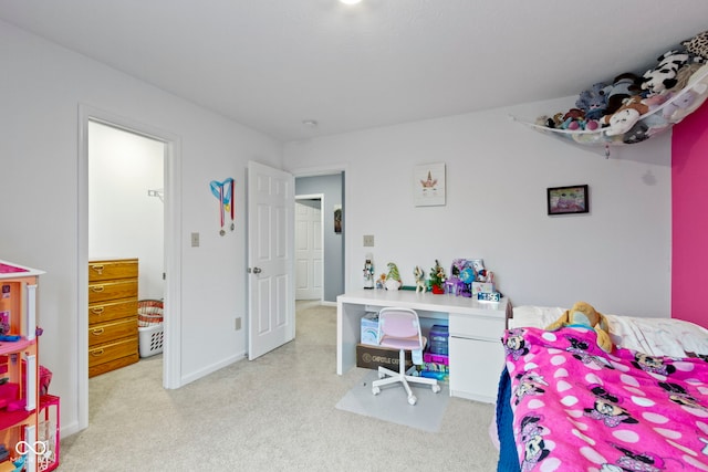 bedroom featuring light colored carpet