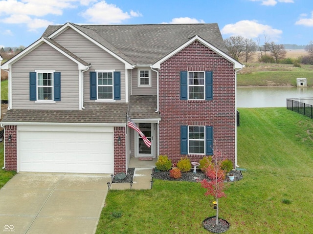 view of front facade featuring a garage and a front lawn