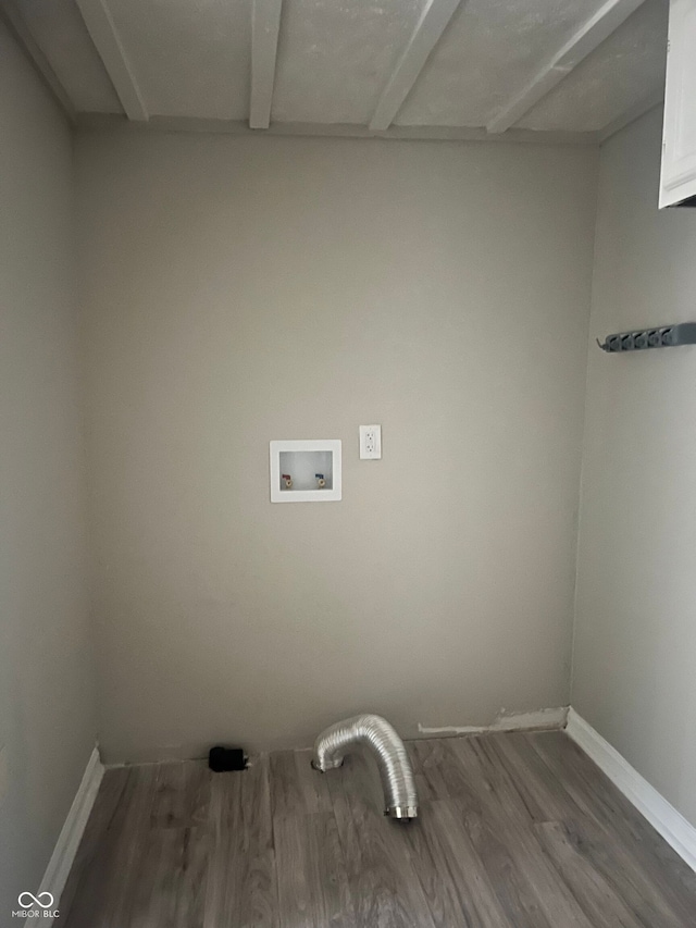 laundry room featuring hardwood / wood-style floors and hookup for a washing machine