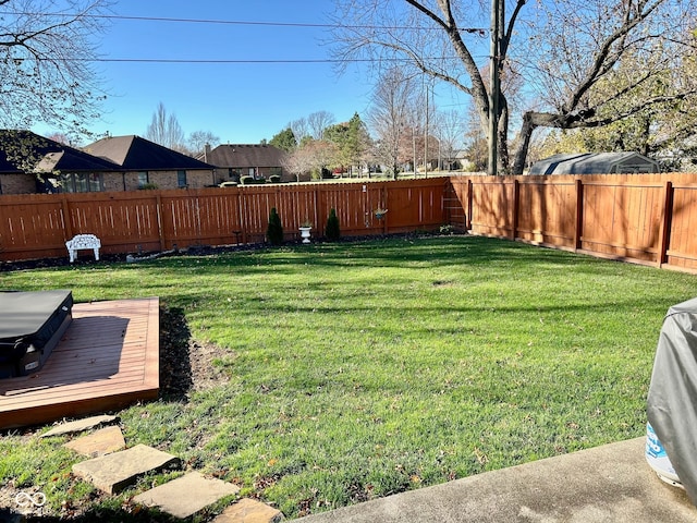 view of yard featuring a wooden deck