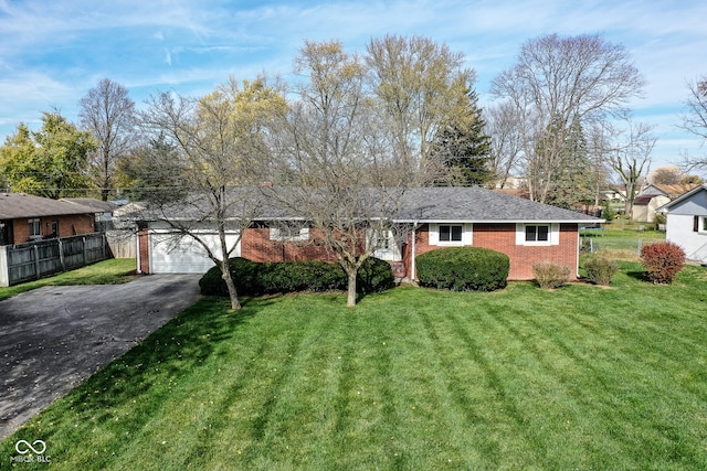 single story home with a front lawn and a garage