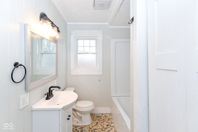 full bathroom featuring ornamental molding, vanity, tile patterned flooring, toilet, and wood walls