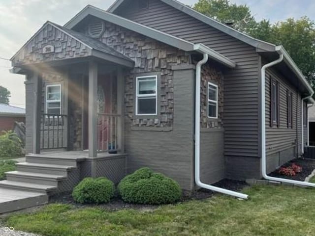 view of front of home with a front yard