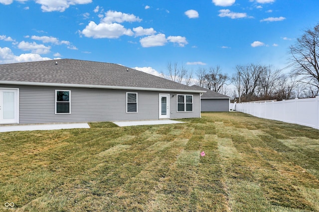 1501 Coen Ct, Columbus, IN 47201 - back of house featuring a patio and roof with shingles