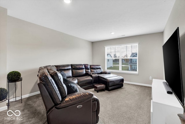 living room featuring dark colored carpet