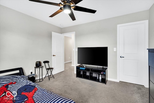 carpeted bedroom with ceiling fan