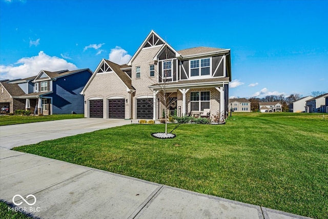 view of front facade featuring a front lawn and a garage