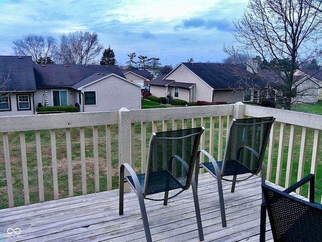 deck featuring a lawn