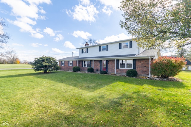 view of front property with a front lawn