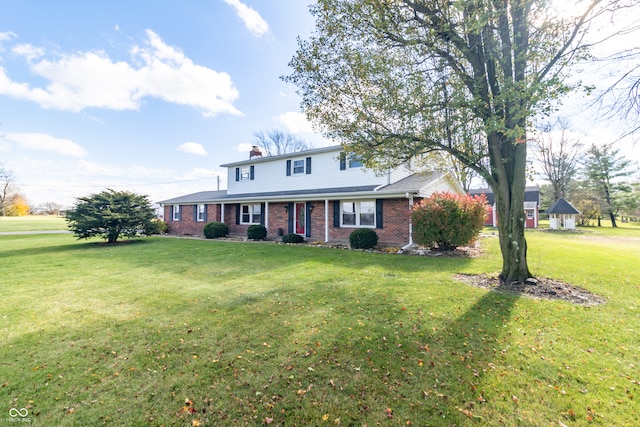 front facade with a front yard