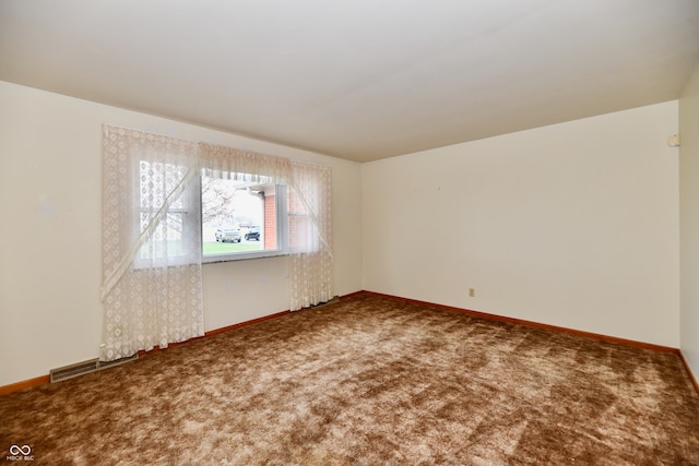 view of carpeted spare room