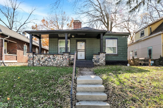 view of front of house featuring a front lawn and a porch