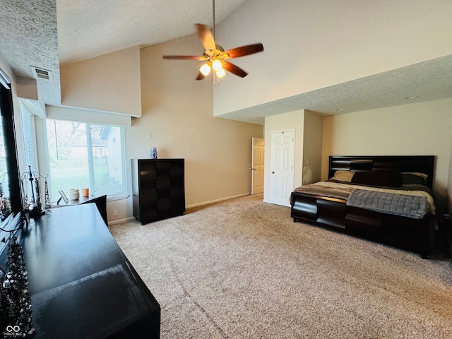 bedroom with ceiling fan, light colored carpet, a textured ceiling, and high vaulted ceiling