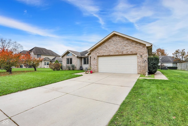 ranch-style home featuring a garage and a front lawn