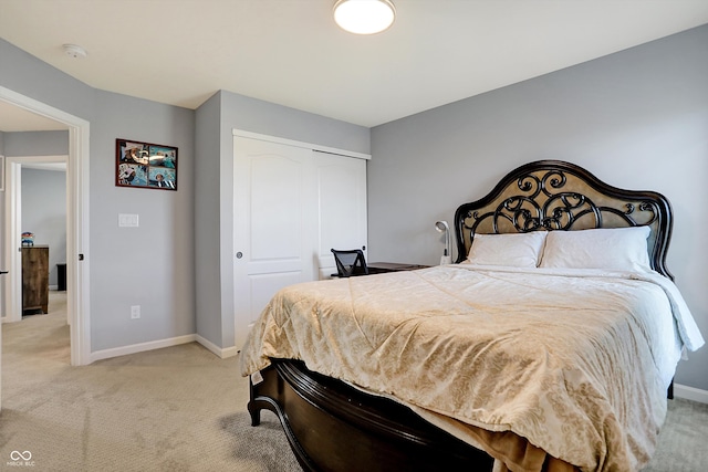 carpeted bedroom with a closet