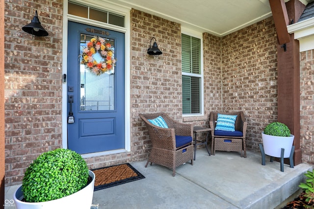 entrance to property featuring a porch