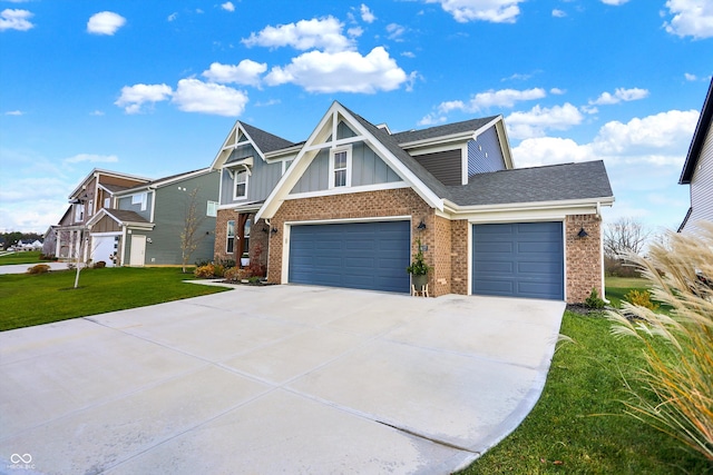 view of front facade featuring a garage and a front lawn