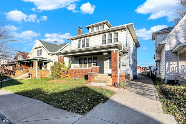 view of front of home featuring a porch and a front yard