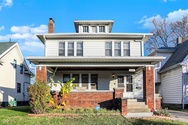 front of property featuring covered porch