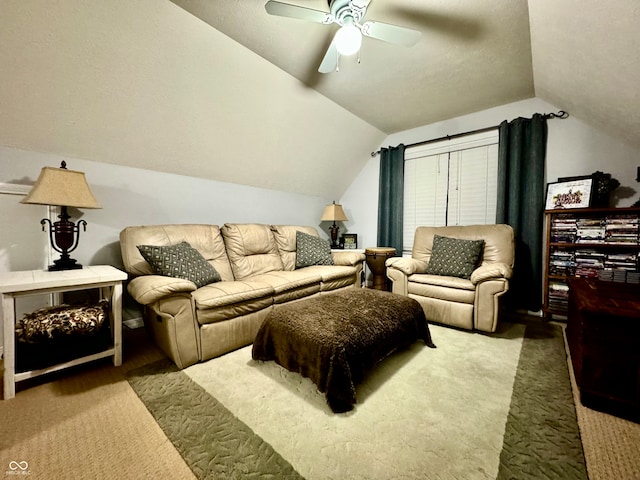 interior space featuring ceiling fan, carpet, and vaulted ceiling