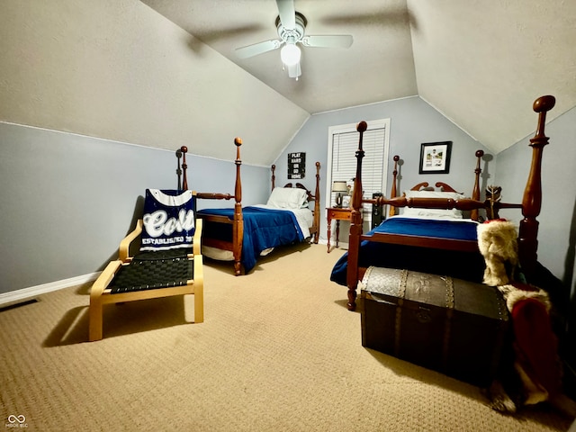 carpeted bedroom with ceiling fan and lofted ceiling