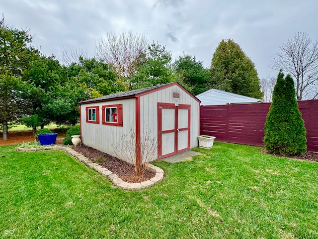 view of outdoor structure with a yard