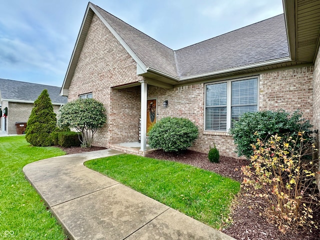 exterior space with a front lawn