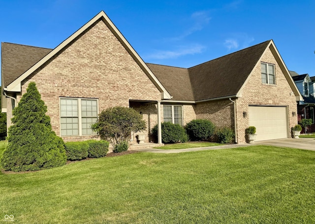 6998 Meredith Dr, Seymour, IN 47274 - view of front facade featuring brick siding, a front yard, roof with shingles, and a garage