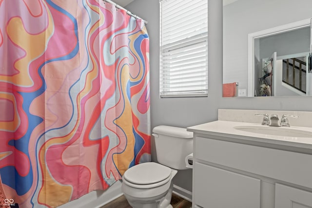 10797 Walden Ln, Brownsburg, IN 46112 - full bathroom with vanity, toilet, and a shower with shower curtain