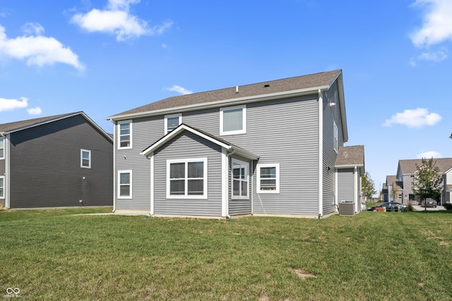 10797 Walden Ln, Brownsburg, IN 46112 - back of house featuring a yard and central AC