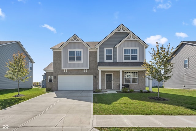 craftsman-style house with a garage and a front lawn