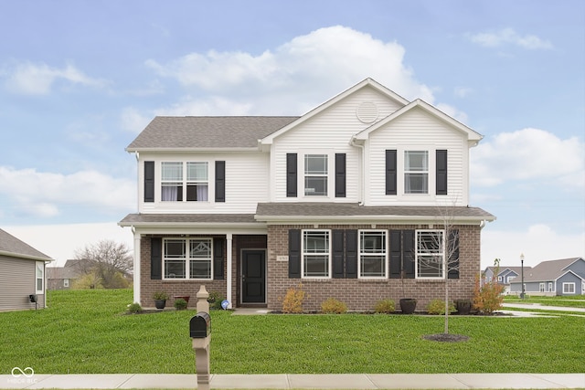 front of property featuring a front lawn