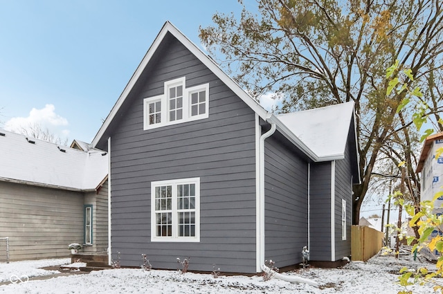 view of snow covered house