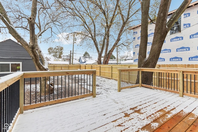 view of snow covered deck