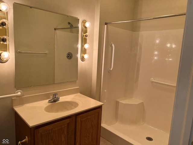 bathroom featuring vanity and walk in shower