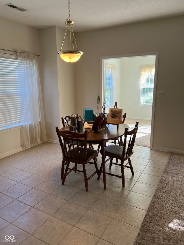 view of tiled dining space