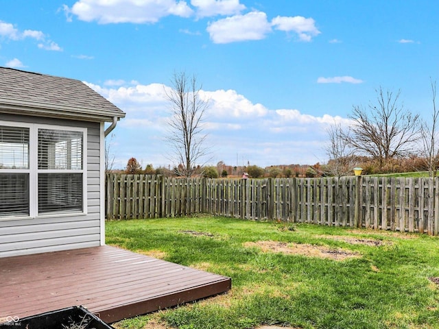 view of yard with a wooden deck