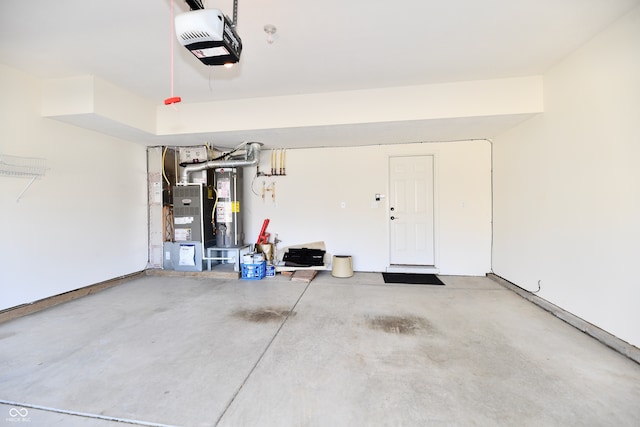 garage featuring gas water heater and a garage door opener